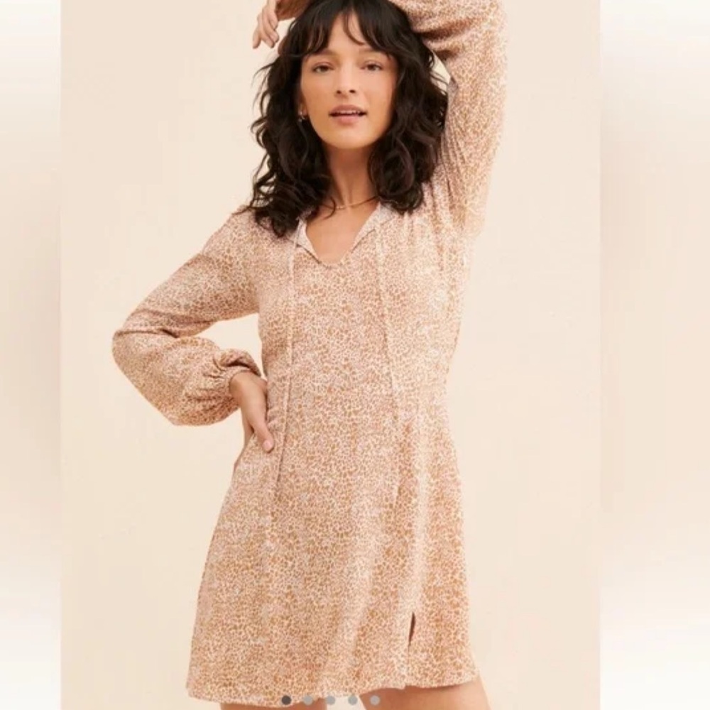 Rue Stiic Mini dress with tie neck gold animal print Retail around $300 small